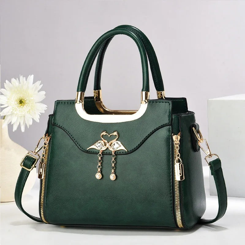 BOLSA DE OMBRO TASSEL