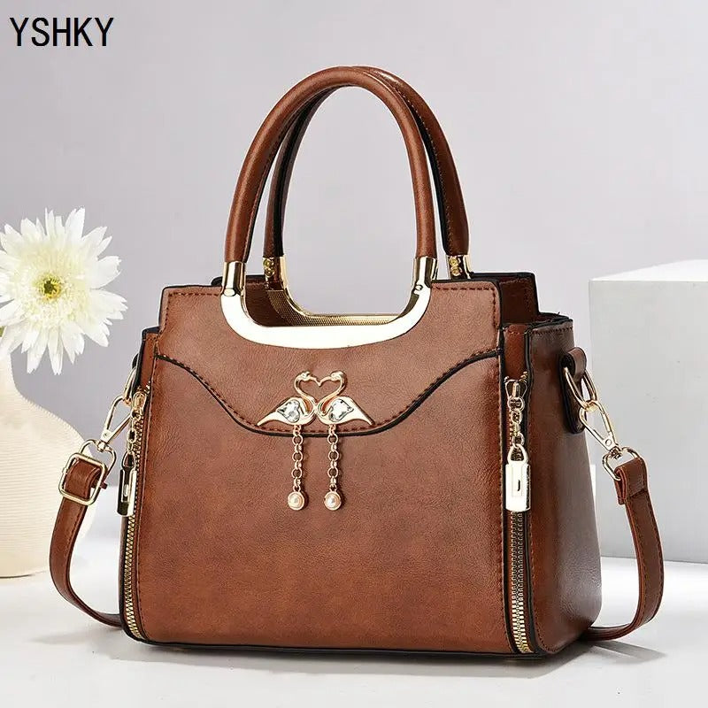 BOLSA DE OMBRO TASSEL