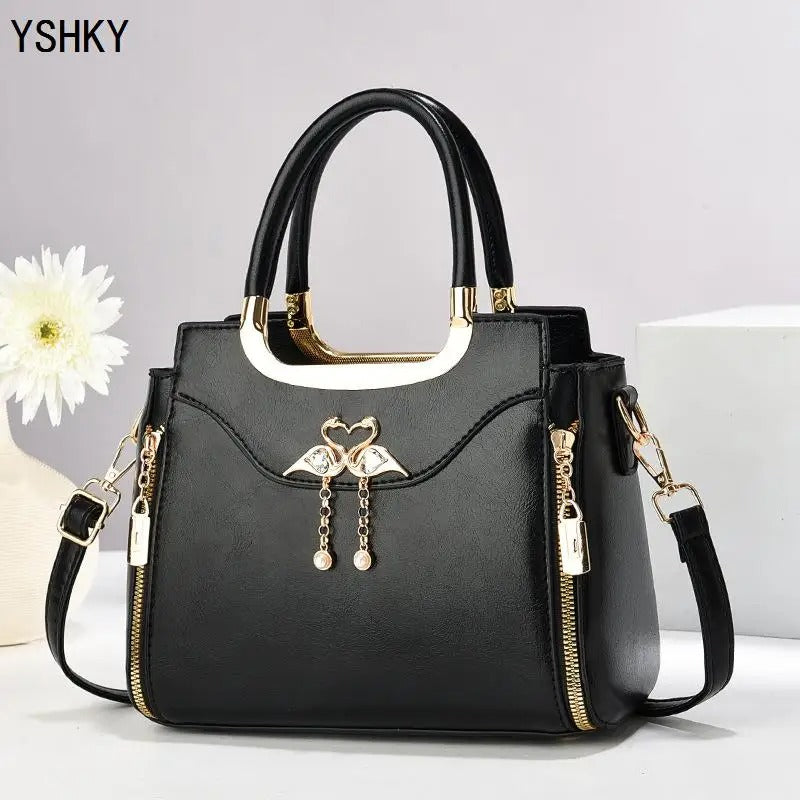 BOLSA DE OMBRO TASSEL